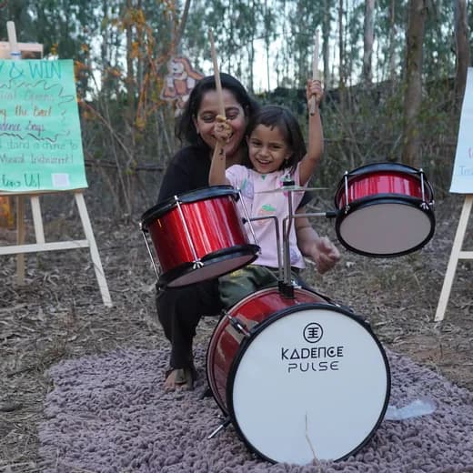 Kid playing a Kadence instrument