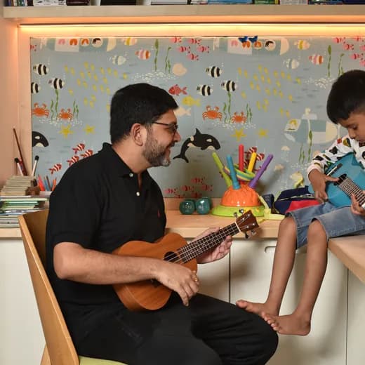 Kid playing a Kadence instrument